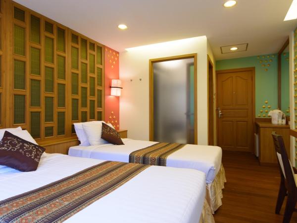 Golden House : photo 1 de la chambre grande chambre deluxe lits jumeaux