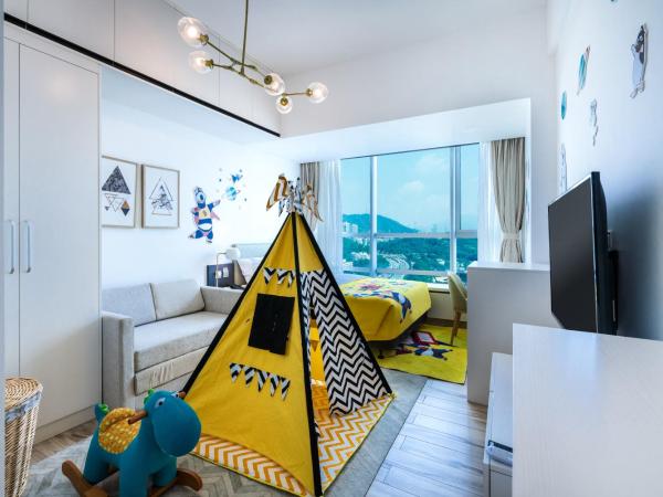 深圳金中环服务公寓-深业上城店 Golden Central Serviced Residence Shenzhen-UpperHills : photo 5 de la chambre appartement avec vue sur la montagne