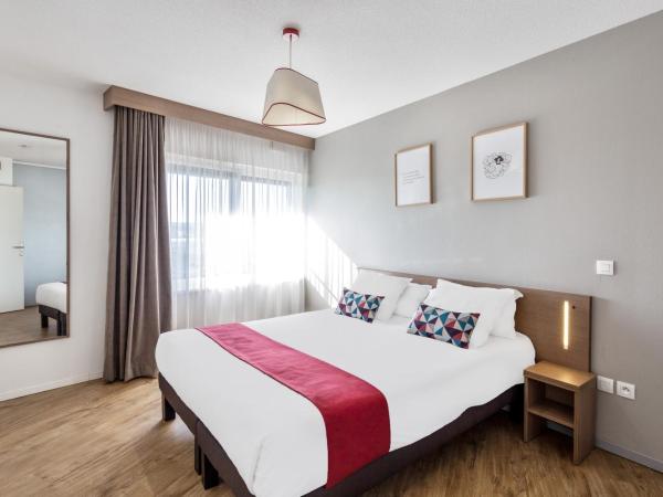 Appart'City Confort Mulhouse : photo 2 de la chambre studio avec lit double