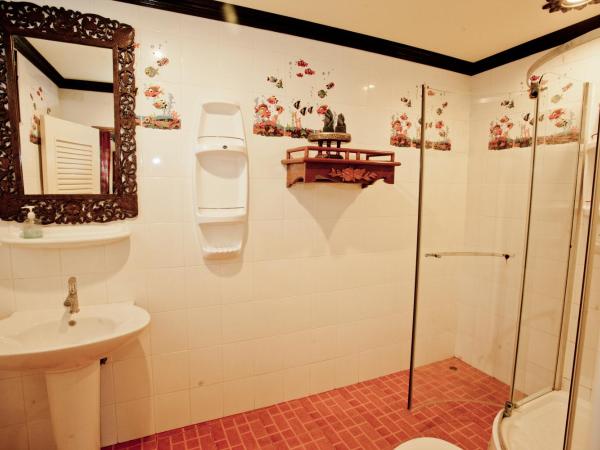 Paradise Pearl Bungalows : photo 4 de la chambre chambre lit queen-size avec balcon