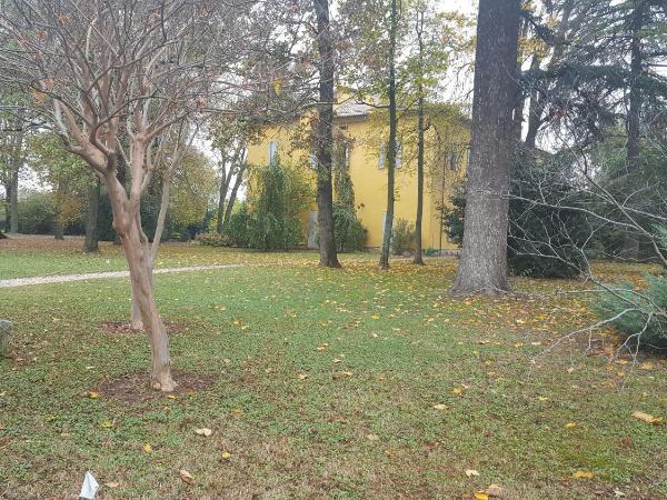 Villa Ghia : photo 5 de la chambre chambre lit king-size - vue sur jardin