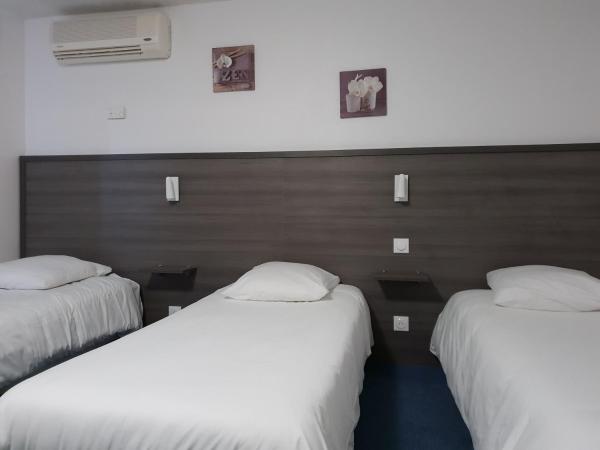 Hôtel Althea - Piscine et Sauna : photo 3 de la chambre chambre triple