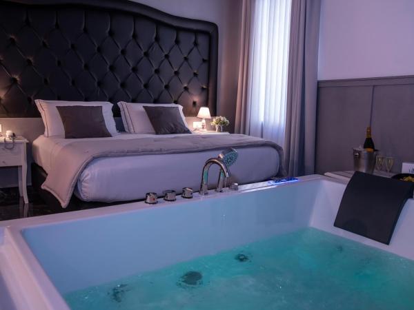 Villa Elisio Hotel & Spa : photo 5 de la chambre chambre lit queen-size avec baignoire spa