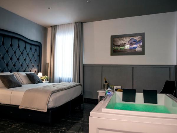 Villa Elisio Hotel & Spa : photo 3 de la chambre chambre lit queen-size avec baignoire spa