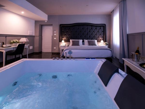 Villa Elisio Hotel & Spa : photo 4 de la chambre chambre lit queen-size avec baignoire spa