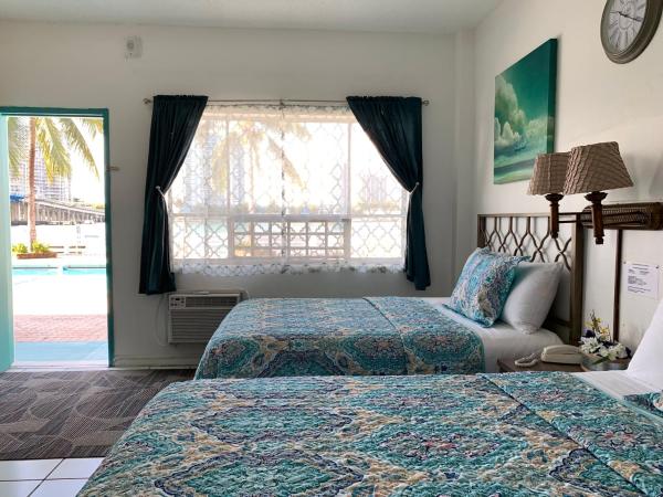 International Inn on the Bay : photo 4 de la chambre chambre double avec patio