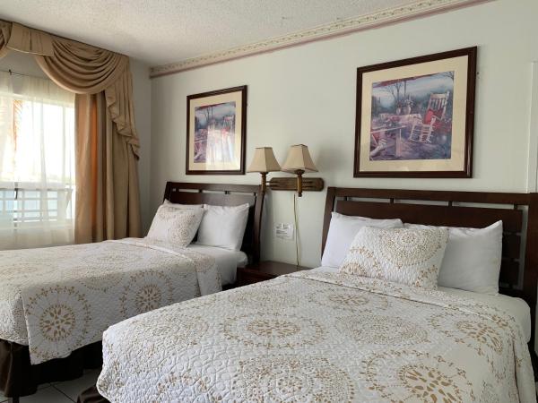 International Inn on the Bay : photo 1 de la chambre chambre double avec balcon