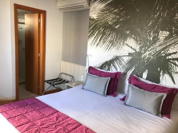 Boulevard Residencial : photo 2 de la chambre chambre lit queen-size avec balcon