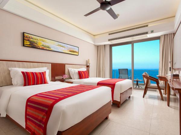 Sanya Seacube Holiday Hotel : photo 3 de la chambre deluxe king or twin room with terrace