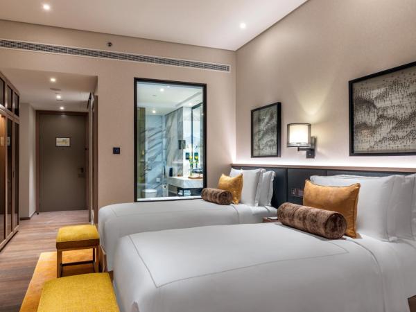 Taj Jumeirah Lakes Towers : photo 3 de la chambre chambre supérieure avec lits jumeaux