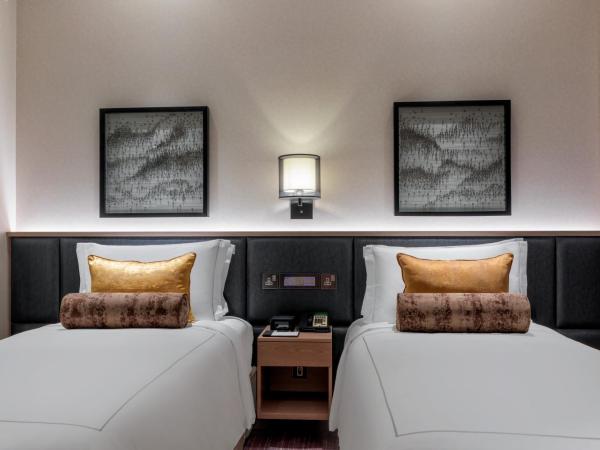 Taj Jumeirah Lakes Towers : photo 2 de la chambre chambre supérieure avec lits jumeaux