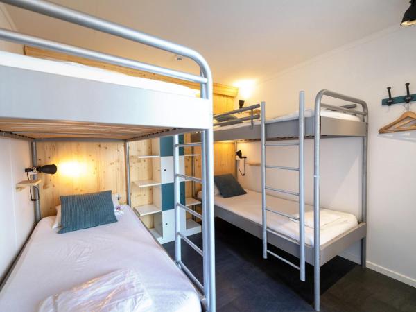 RiverLodge TCS Training & Freizeit AG : photo 5 de la chambre chambre quadruple avec salle de bains commune