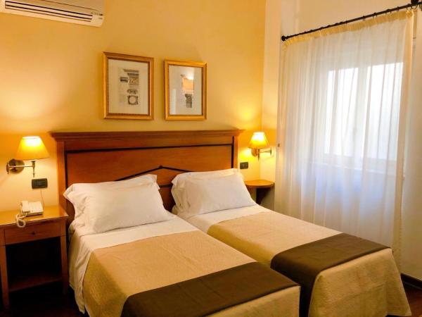 Hotel Florio Operà Palermo Central : photo 1 de la chambre chambre lits jumeaux