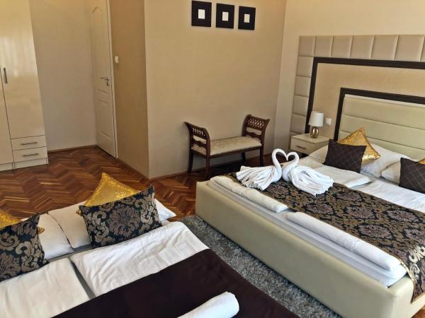 Melior Szálló : photo 4 de la chambre chambre quadruple en duplex