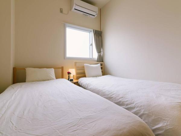 TEN APARTMENT HOTEL : photo 9 de la chambre appartement 2 chambres