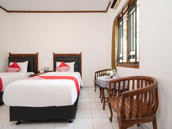 Super OYO 1778 Omah Duwet : photo 6 de la chambre chambre lits jumeaux standard