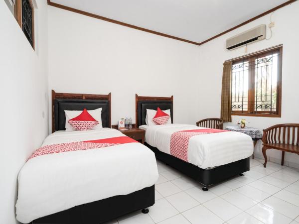 Super OYO 1778 Omah Duwet : photo 5 de la chambre chambre lits jumeaux standard