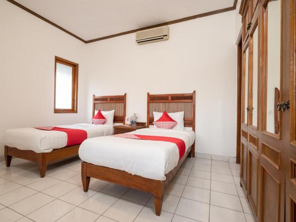 Super OYO 1778 Omah Duwet : photo 3 de la chambre chambre lits jumeaux standard