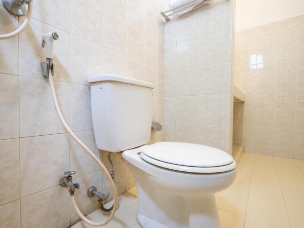 Super OYO 1778 Omah Duwet : photo 10 de la chambre chambre lits jumeaux standard