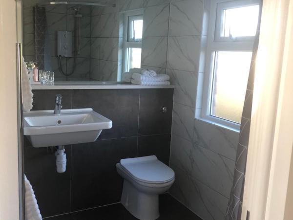 South Avenue B&B : photo 9 de la chambre suite supérieure lit king-size