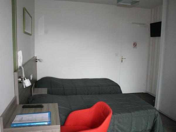 Hôtel Le Relais Dax : photo 1 de la chambre chambre lits jumeaux avec balcon