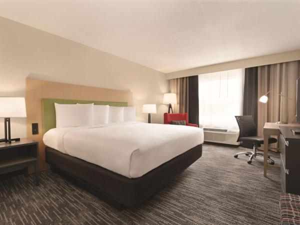 Country Inn & Suites by Radisson, Savannah Midtown, GA : photo 1 de la chambre suite 1 chambre lit queen-size - non-fumeurs