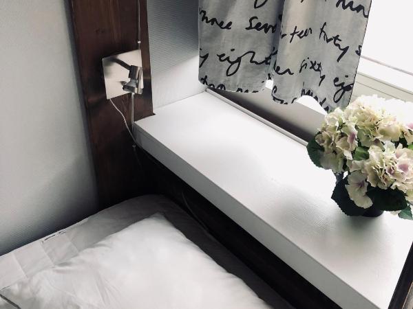 Multi Challenge Hostel : photo 2 de la chambre chambre quadruple