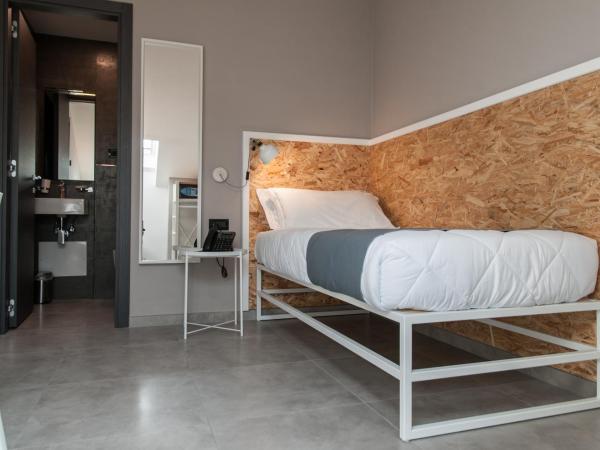 Residence Hotel Moderno : photo 1 de la chambre chambre simple supérieure mansardée