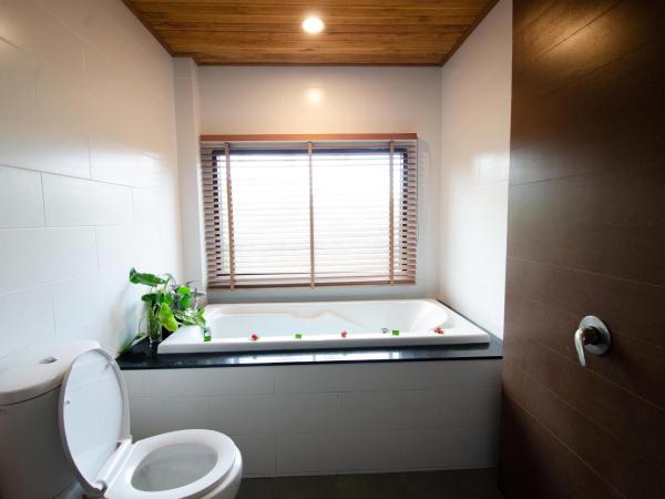 Khum Laanta Resort - SHA Extra Plus : photo 5 de la chambre bungalow de luxe lits jumeaux