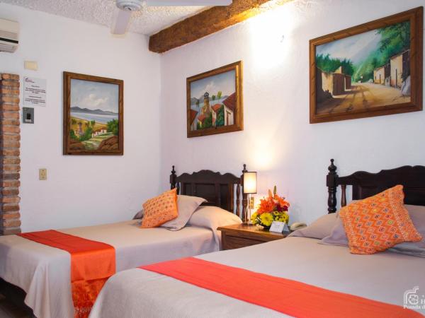 Hotel Posada De Roger : photo 3 de la chambre chambre double avec 2 lits doubles