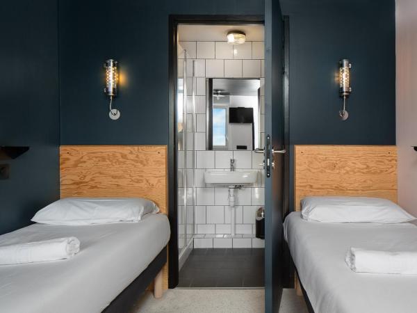 Eklo Clermont Ferrand Centre Gare : photo 1 de la chambre chambre lits jumeaux