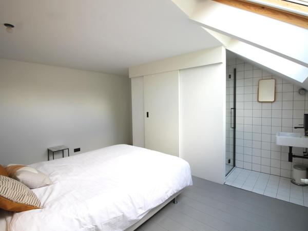 Canopée guesthouse : photo 1 de la chambre chambre lit king-size