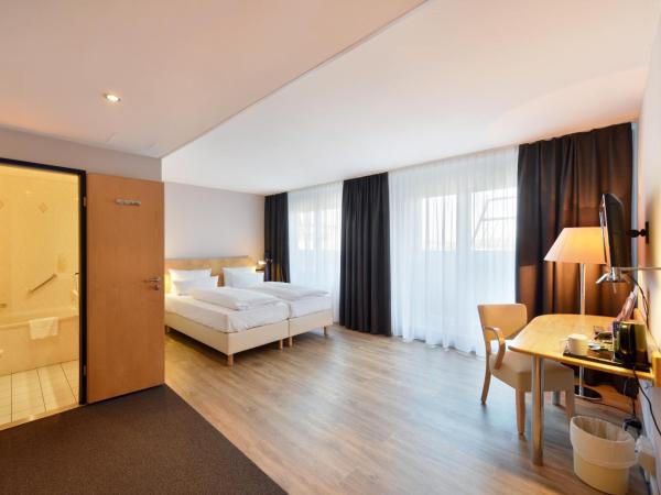 Amedia Dresden Elbpromenade, Trademark Collection by Wyndham : photo 3 de la chambre chambre salon