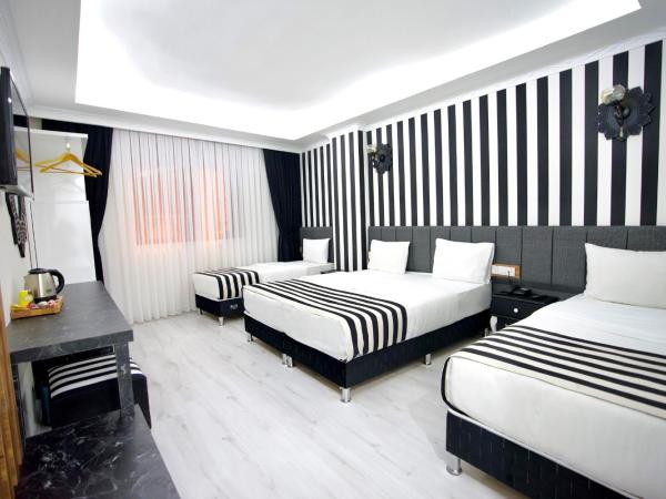 Cnr İnci Hotel : photo 4 de la chambre chambre quadruple deluxe