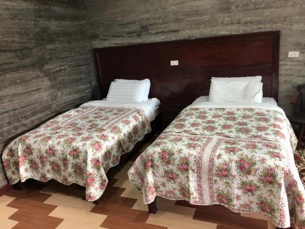 เลาลีฮิลล์รีสอร์ท Laulee hill resort : photo 1 de la chambre chambre lits jumeaux deluxe