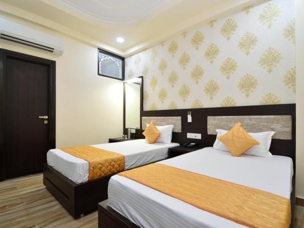 Kapish Home-All Pure Veg : photo 9 de la chambre chambre lits jumeaux standard