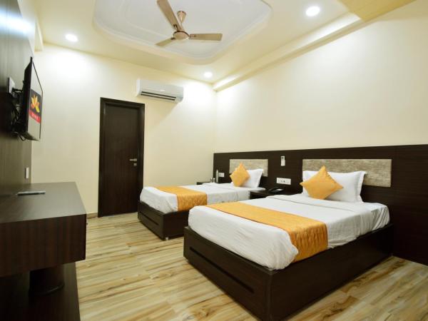 Kapish Home-All Pure Veg : photo 6 de la chambre chambre lits jumeaux standard