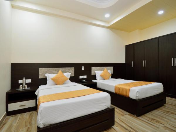 Kapish Home-All Pure Veg : photo 4 de la chambre chambre lits jumeaux standard