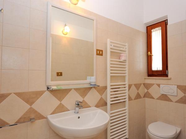 Hotel San Sebastiano : photo 4 de la chambre chambre triple