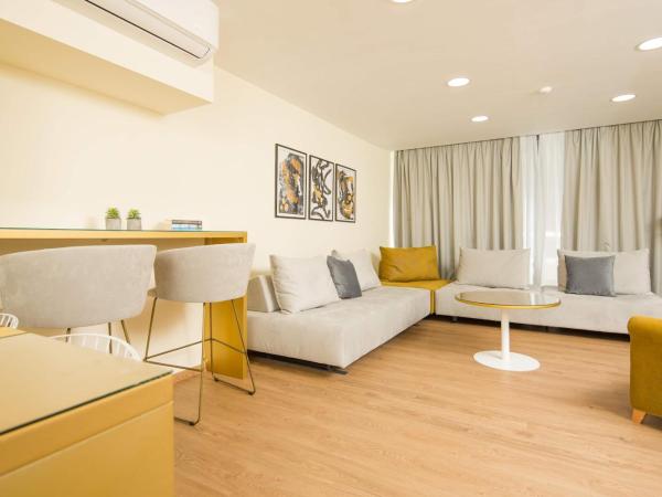 SUITES@SYNGROU-FIX : photo 10 de la chambre suite familiale