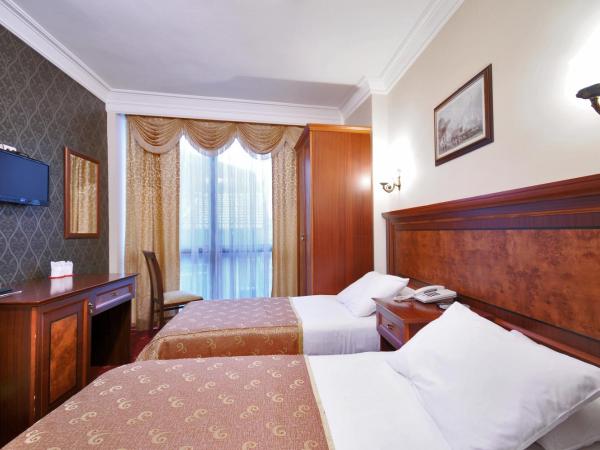 Grand Eyuboglu Hotel : photo 1 de la chambre chambre double ou lits jumeaux