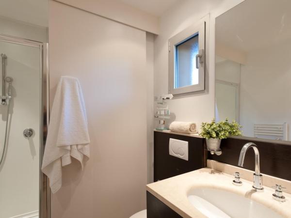 Résidence Marina Di Santa Giulia : photo 10 de la chambre appartement premium - 2 chambres - cala sultana