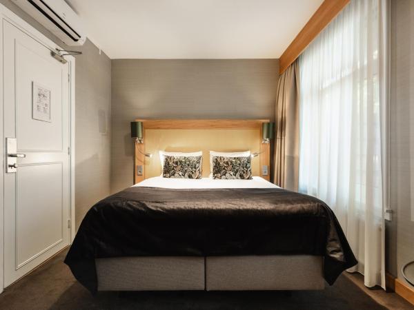 The Delphi - Amsterdam Townhouse : photo 1 de la chambre petite chambre lit queen-size