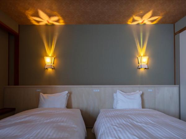 Gion Ryokan Karaku : photo 3 de la chambre chambre lits jumeaux avec tatami