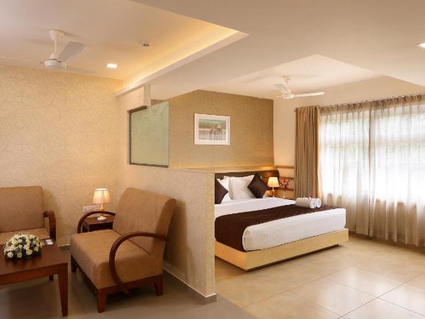 Flora Charishma Residency Aluva : photo 1 de la chambre grande chambre double