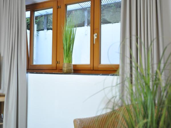 Villa Waldperlach by Blattl : photo 4 de la chambre chambre simple - sous-sol