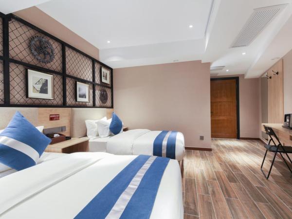 Zou Qu Ye Travel Hotel : photo 7 de la chambre chambre lits jumeaux standard