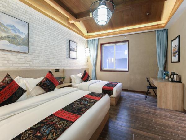 Zou Qu Ye Travel Hotel : photo 1 de la chambre chambre lits jumeaux Économique