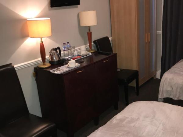 The Ocean Inn : photo 1 de la chambre chambre lits jumeaux avec salle de bains