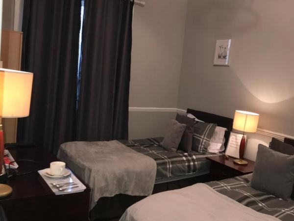 The Ocean Inn : photo 2 de la chambre chambre lits jumeaux avec salle de bains